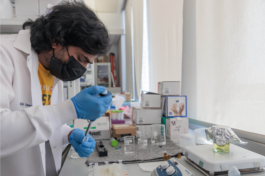 Lab work with blue gloves